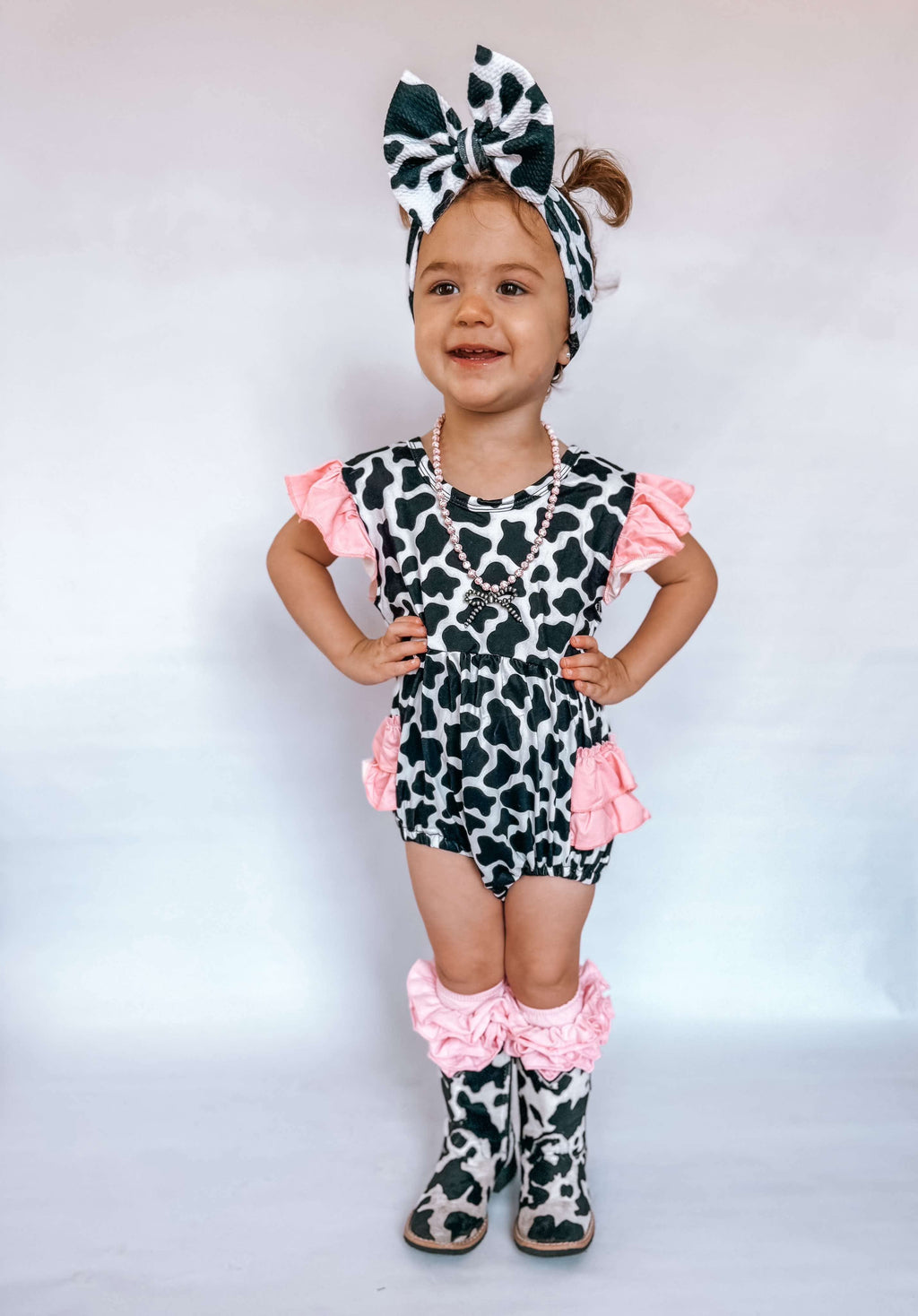 Cow Print With Pink Ruffles Romper