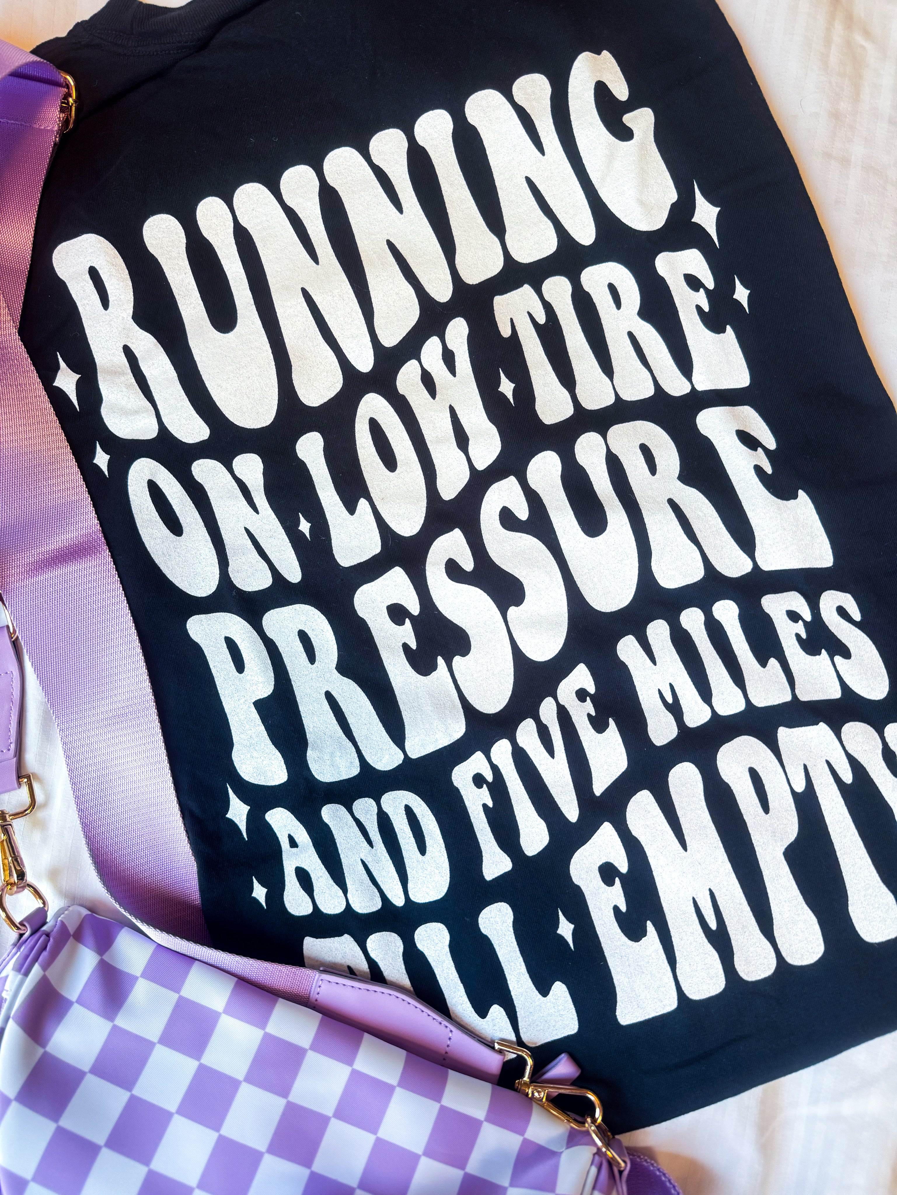 Running on low tire pressure Graphic Tee
