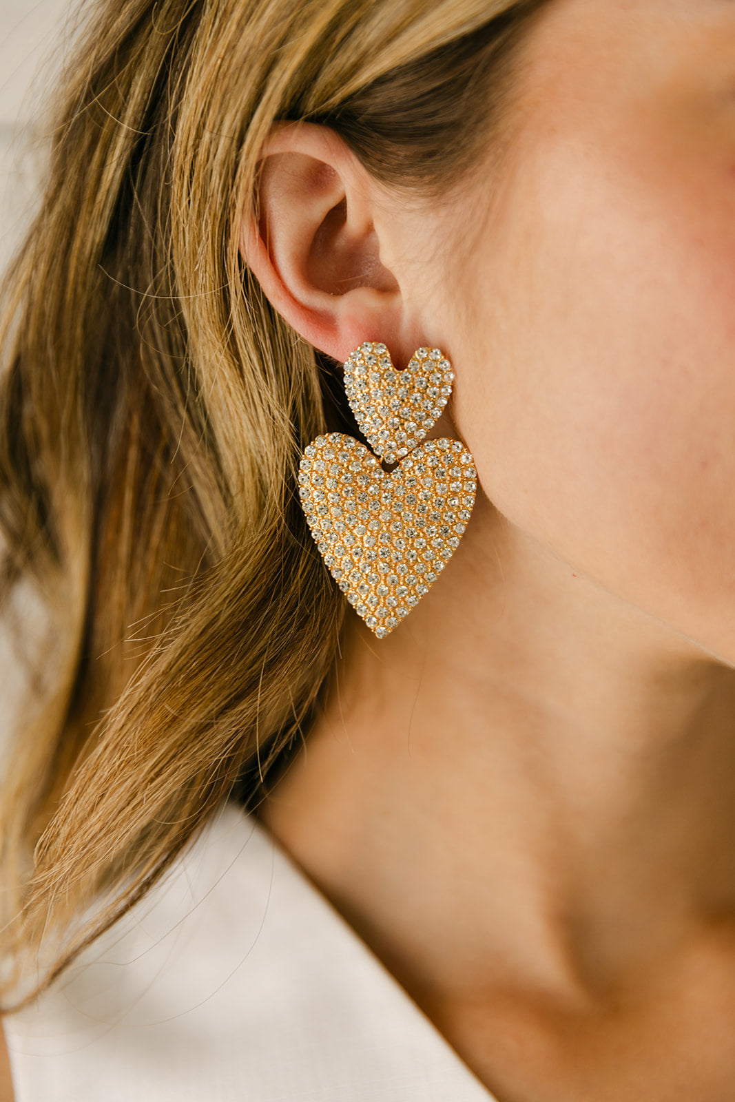 The Moxie Rhinestone Heart Earrings in Gold