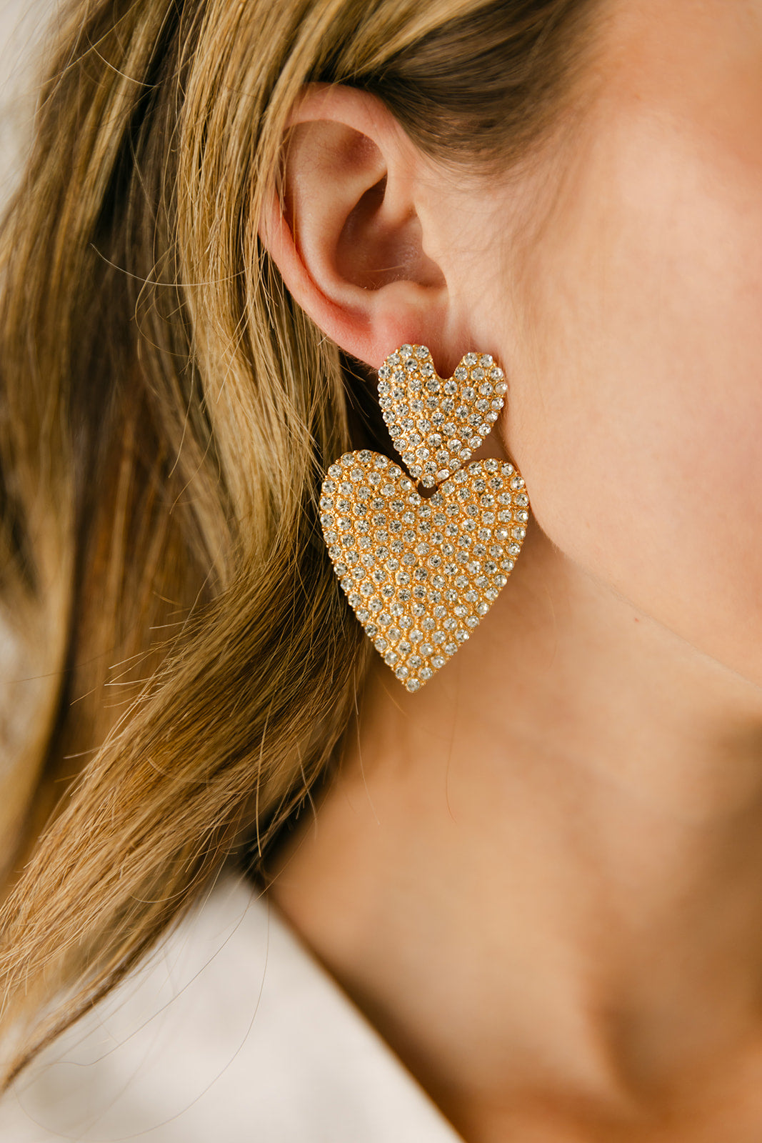 The Moxie Rhinestone Heart Earrings in Gold