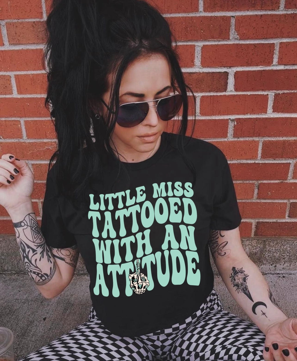 Tattooed With An Attitude