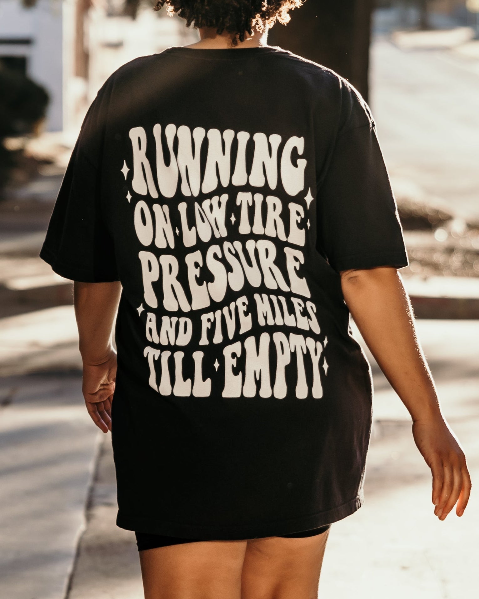 Running on low tire pressure Graphic Tee