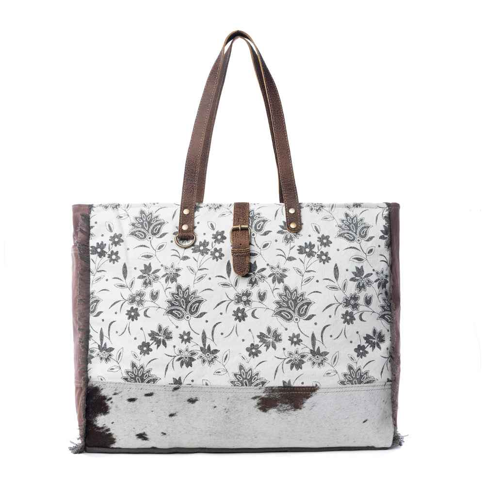 Myra Ursinia Weekender Bag for Women with upcycled canvas and genuine leather with hairon hide and floral print