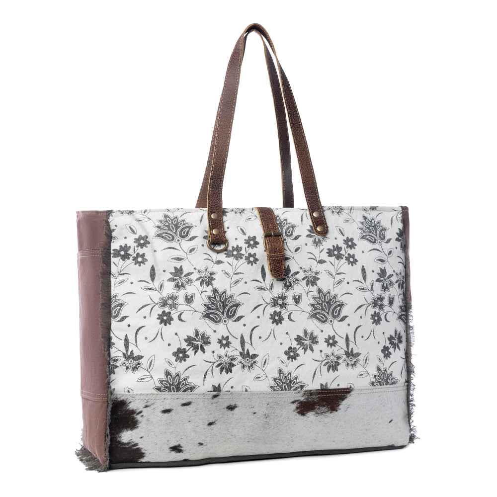 Myra Ursinia Weekender Bag for Women with upcycled canvas and genuine leather with hairon hide and floral print